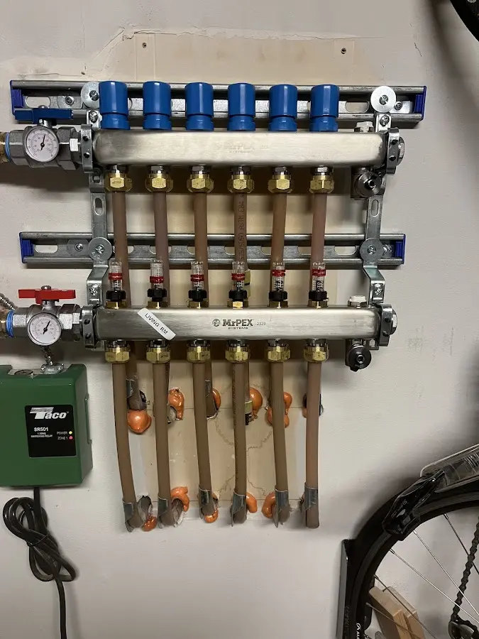 Plumber performing Water Heater Repair at a residential property in Auburn